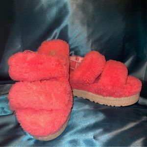 Pink UGG platform slides